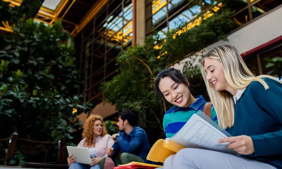 diverse-group-of-student-siting-in-campus-learning-2026-01-08-00-11-34-utc